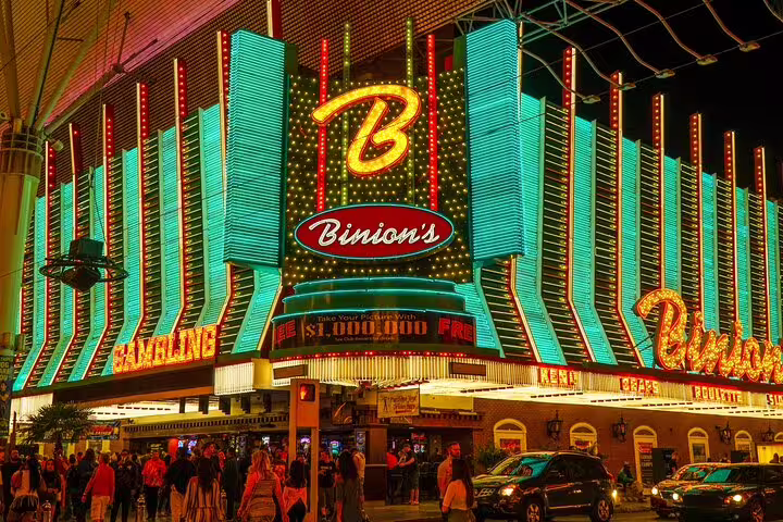 Binion's Casino neon signs glowing at night on Fremont Street in Las Vegas