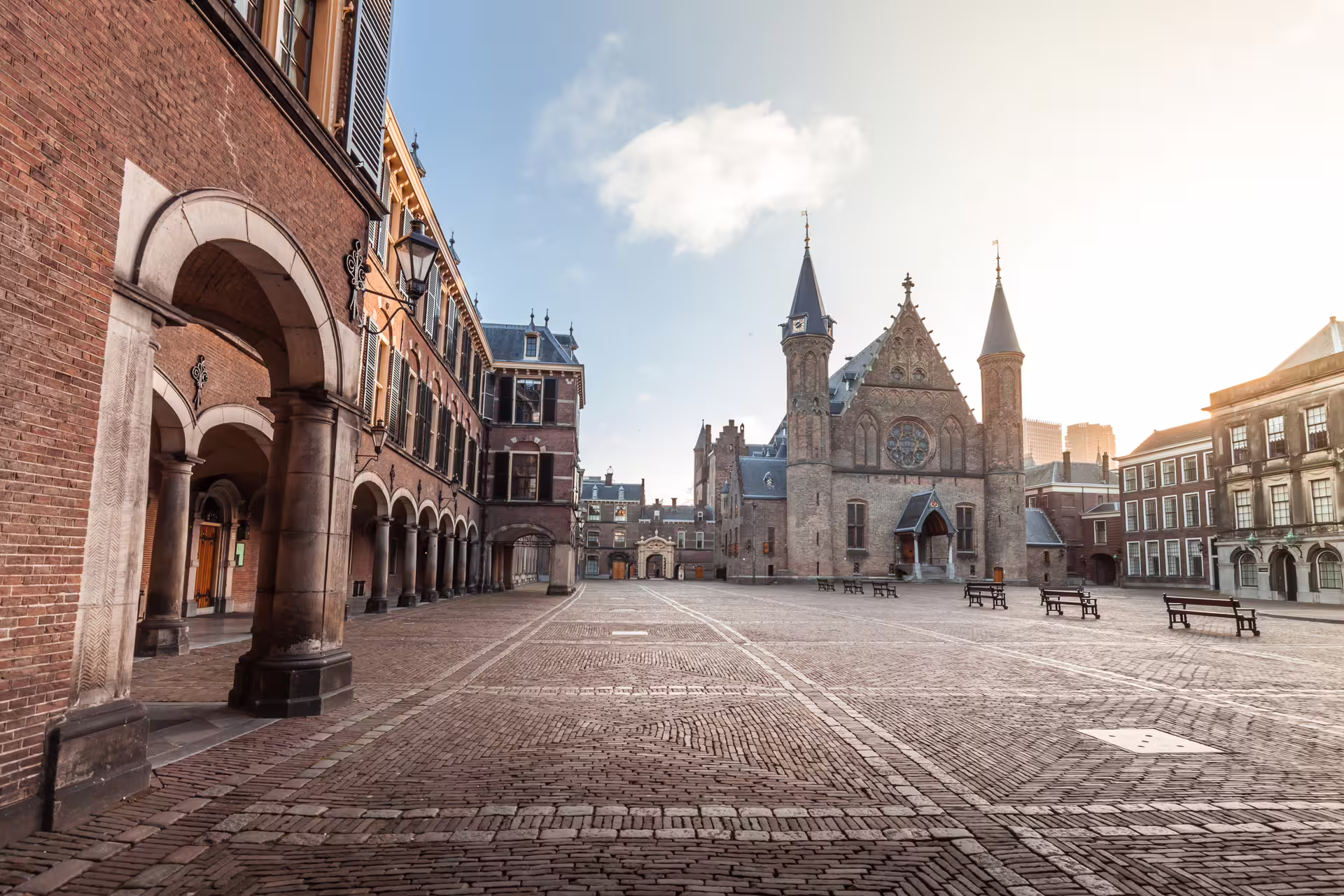 Binnenhof courtyard in The Hague at sunrise, key stop on a 1-day walking tour with multilingual audioguide