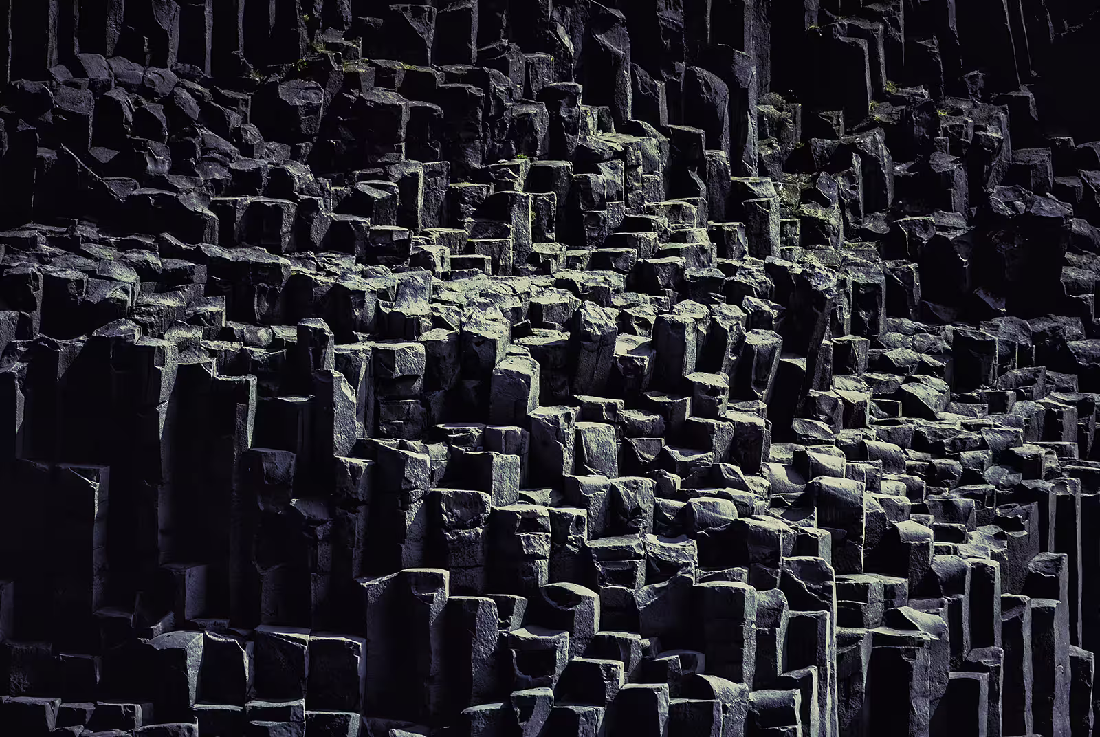 Black basalt column formations on Iceland's South Coast near Reynisfjara beach