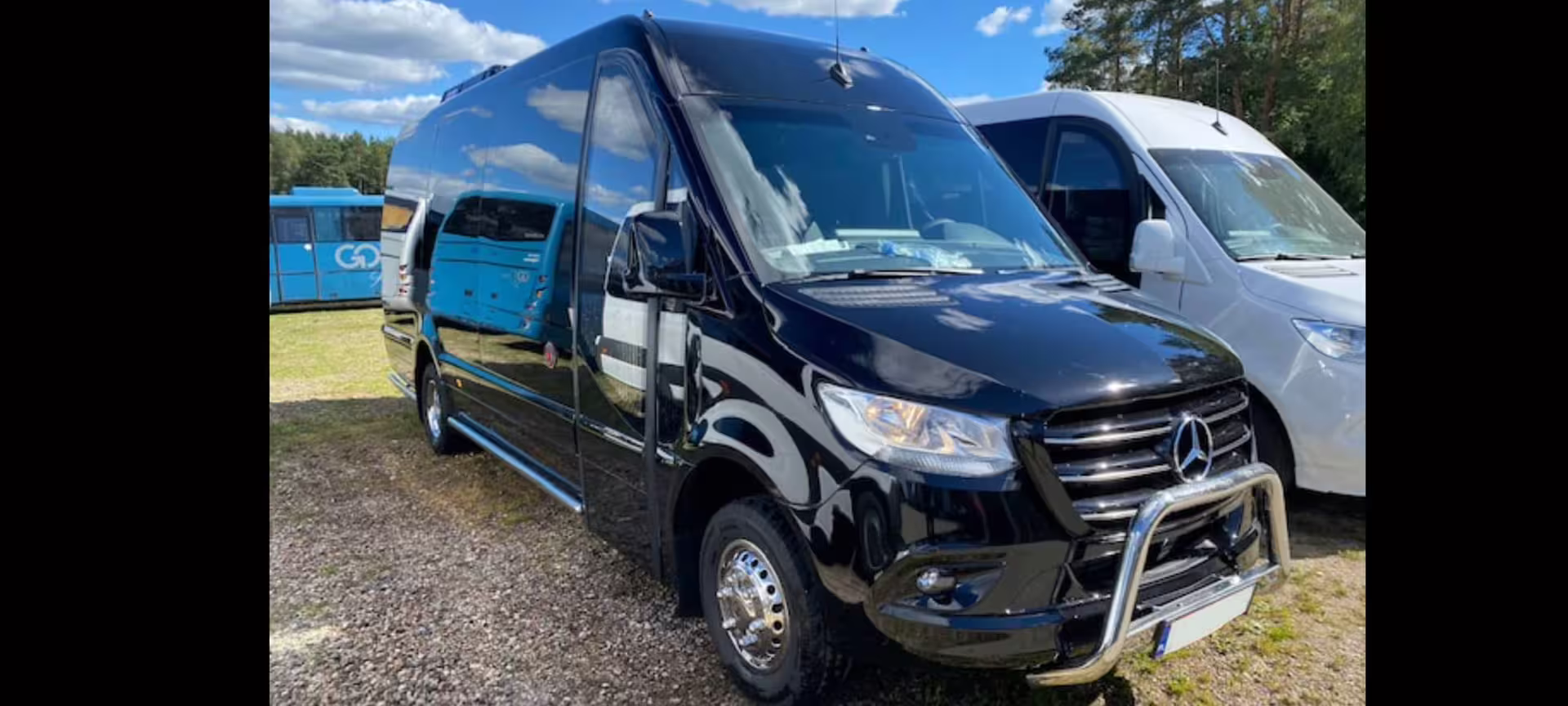Black Mercedes-Benz Sprinter van for Reykjavik hotel pickup and drop-off service