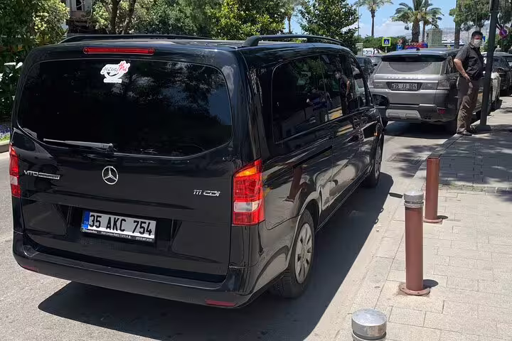 Rear view of black Mercedes van for Izmir Airport transfer, safe private transportation with luggage space