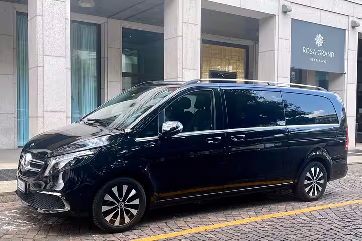 Elegant black Mercedes van ready for private transfer from Milan, offering luxury and comfort for the journey to Zermatt.