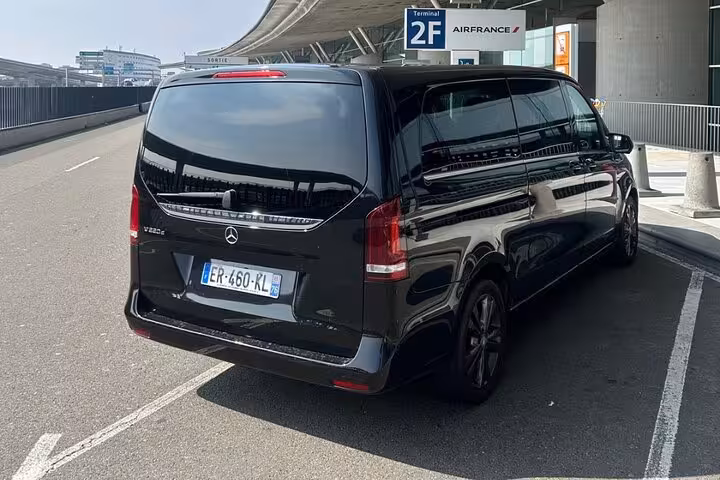 Black Mercedes V-Class van parked at Paris Charles de Gaulle Airport Terminal 2F Air France