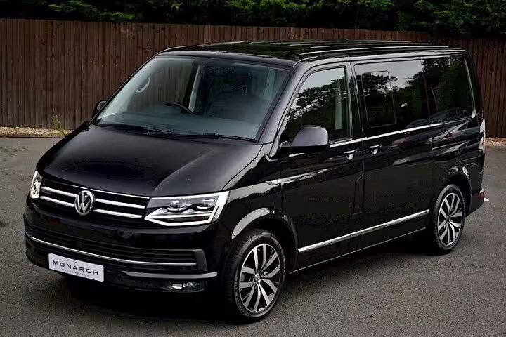 Black Volkswagen Transporter T6 luxury van for private airport transfer service