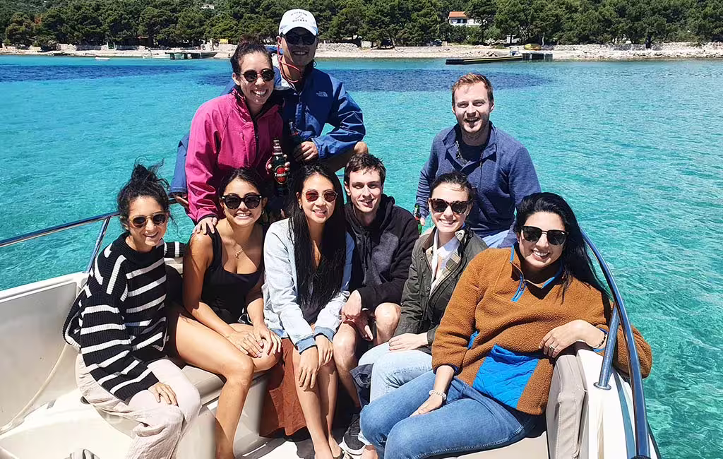 Small group on boat in turquoise Blue Lagoon, enjoying half-day tour to Šolta and Čiovo from Split or Trogir