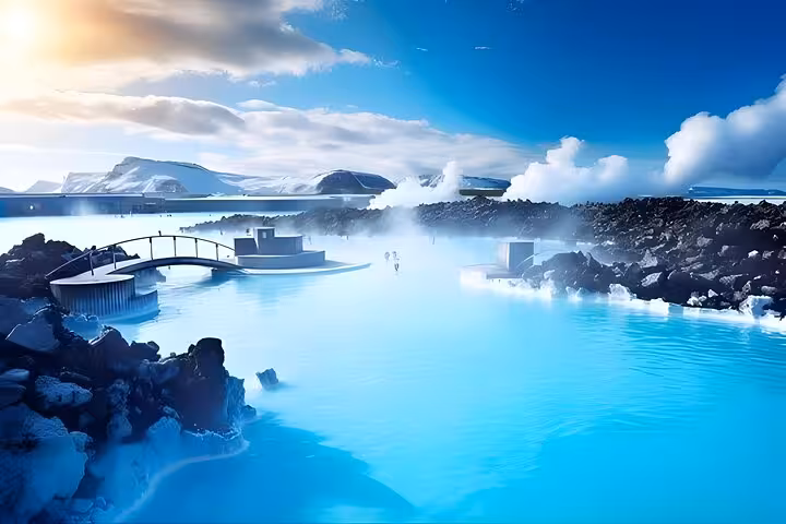 Blue Lagoon geothermal spa with vivid turquoise waters, steam rising, lava rocks, and bridge in Iceland