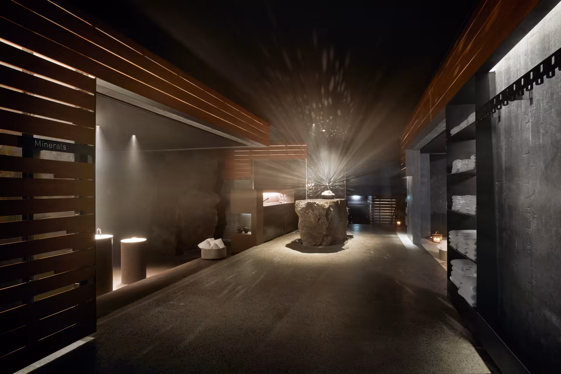 Luxurious Blue Lagoon Iceland spa interior with volcanic rock centerpiece and ambient lighting on Iceland sunrise proposal tour