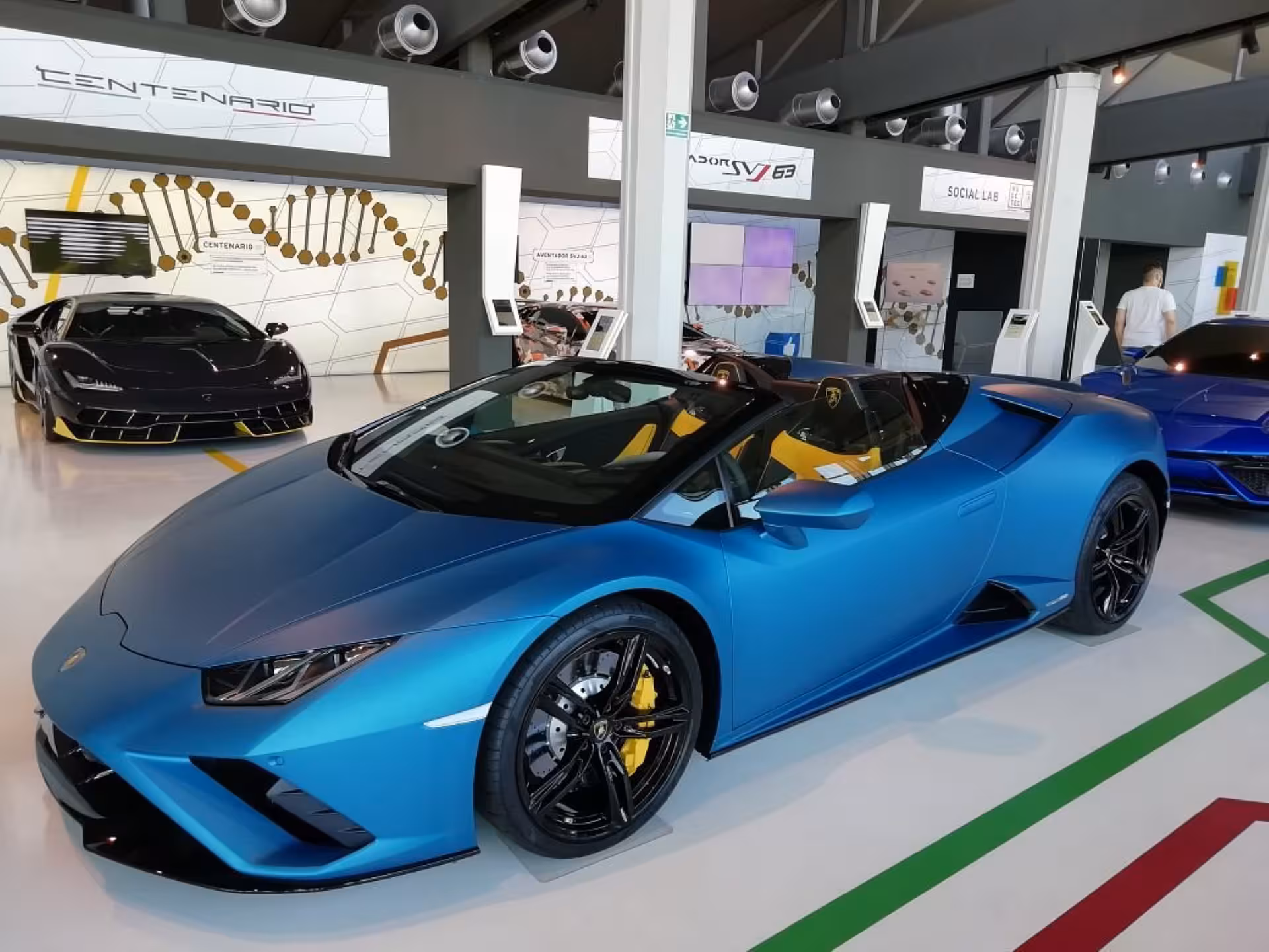 Blue Lamborghini Huracán Spyder inside Automobili Lamborghini Museum Bologna, part of Lamborghini and Ducati tour