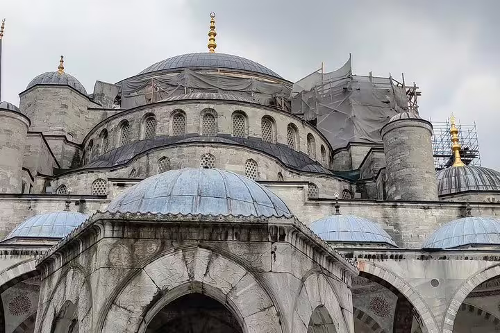 Blue Mosque exterior domes and stone arches, a key stop on a private 7-hour Istanbul highlights tour
