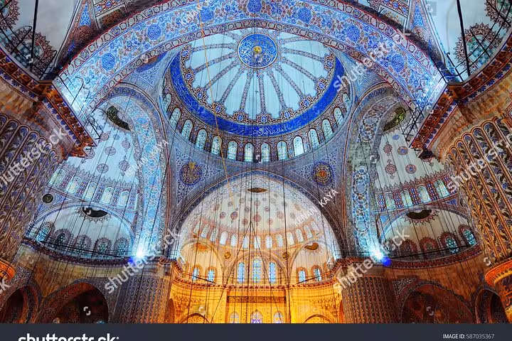 Blue Mosque interior dome with Iznik tile mosaics, featured on Istanbul Old City private guide and car tour