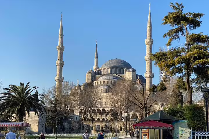 Blue Mosque in Istanbul with minarets and courtyard gardens, highlight of 13-day guided Turkey history tour