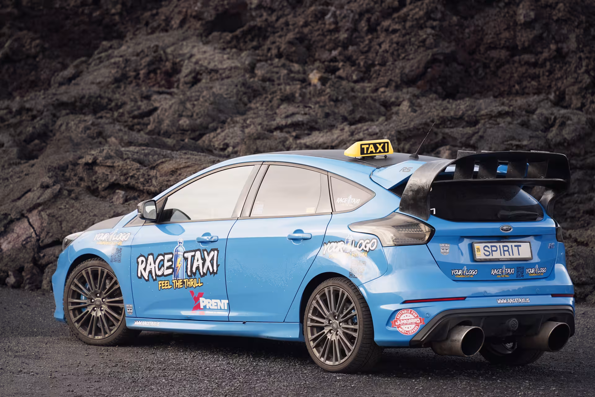 Blue rally race taxi car parked on Iceland lava fields, Golden Circle Rally Car Experience photo
