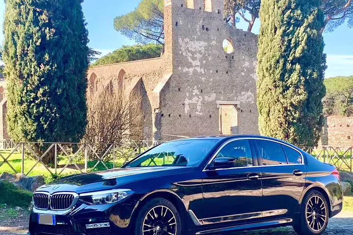 Sleek black BMW 5 Series sedan for private transfer from Amsterdam Cruise Port to The Hague