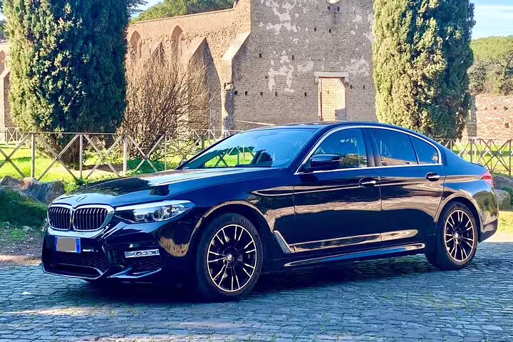 Premium black BMW 5 Series sedan available for private transfer from Oslo Airport to Trysil Ski Resort