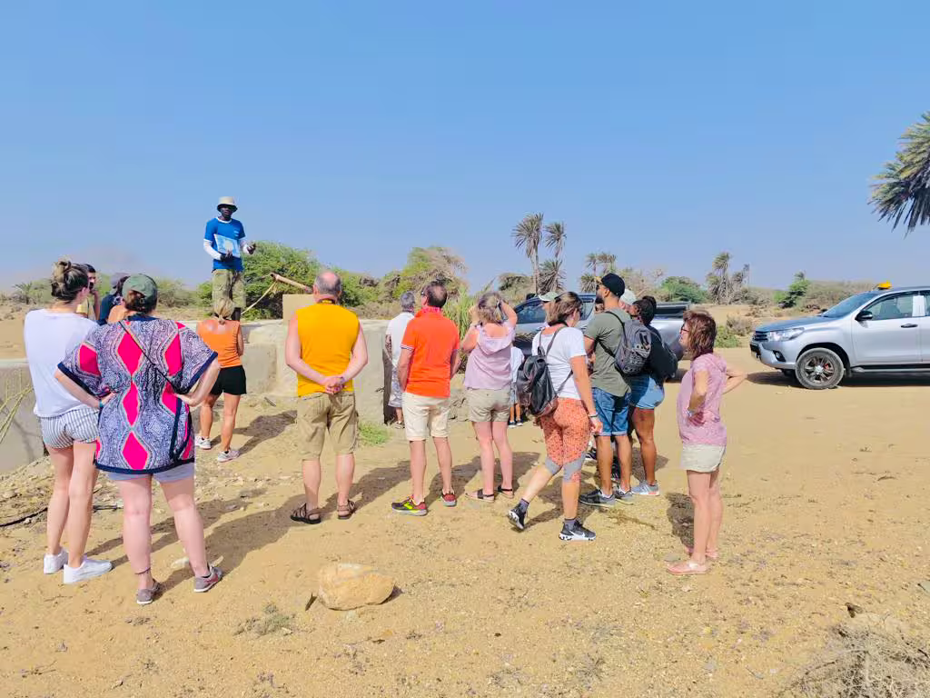 Tour group briefing on Boa Vista Island 4x4 safari, exploring wild beaches and Viana Desert landscapes