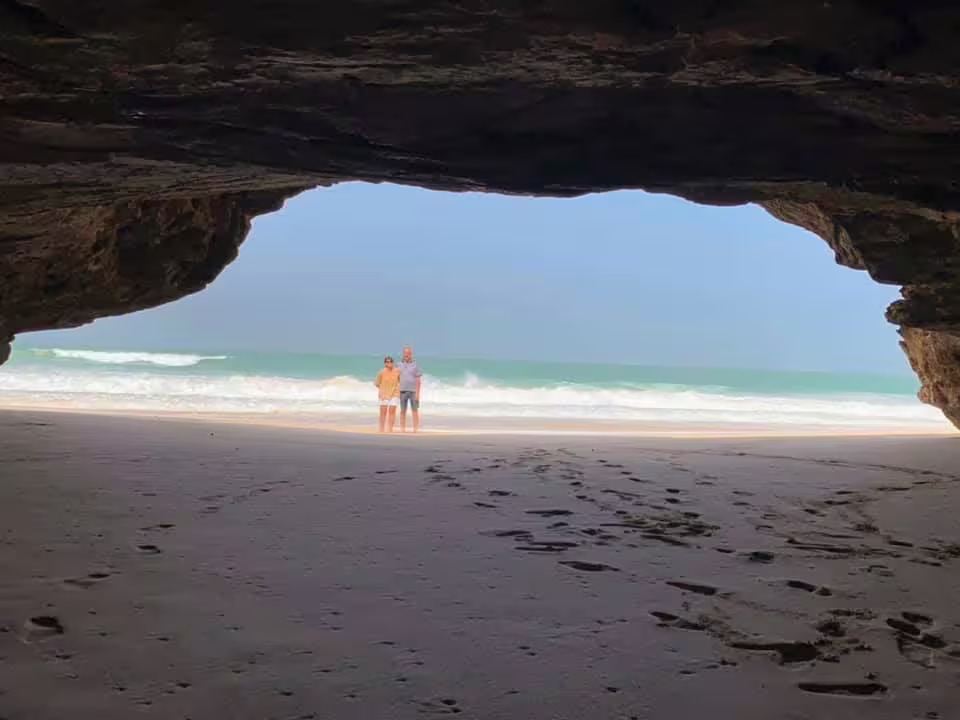 Explore the hidden beach cave on Boa Vista's Shark & Turtle Bay, Desert, Shipwreck & Santa Mónica Beach Tour.