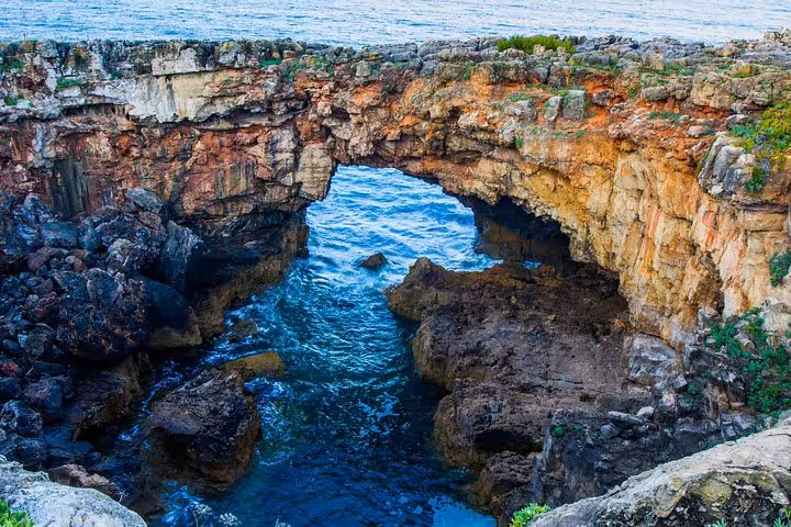 Scenic view of Boca do Inferno’s dramatic cliffs and ocean waves in Cascais, a must-see on the private Sintra tour.