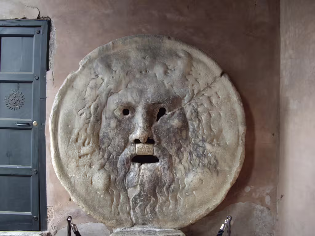 Close-up of the Bocca della Verità stone mask, a classic stop on a 3-hour private luxury vehicle tour of historic Rome