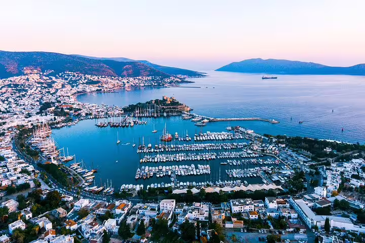 Aerial view of Bodrum Marina and Aegean coastline at dusk, featured on Turkey Taste 12-day small group tour