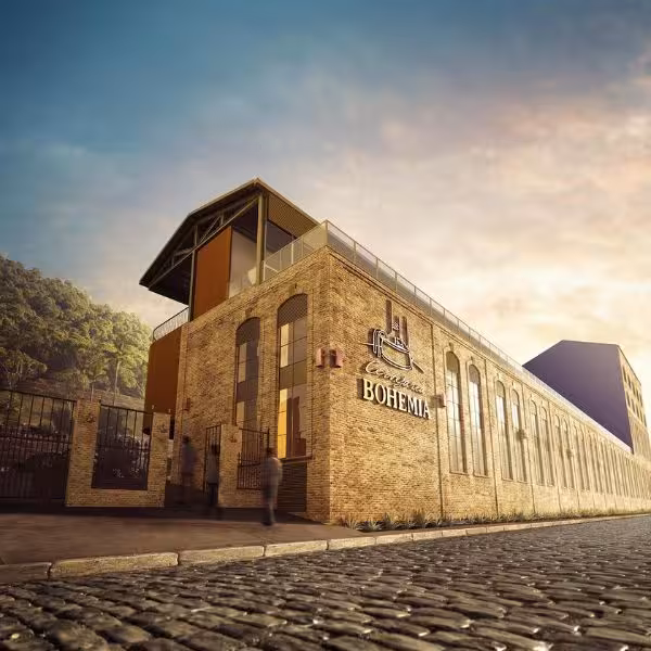 Historic Bohemia Brewery in Petrópolis, Brazil, showcasing its iconic architecture at sunset on a private city tour.