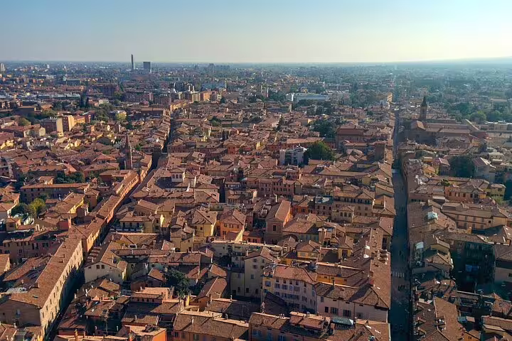 Aerial view of Bologna’s terracotta rooftops and historic streets explored on a 2-hour private walking city tour