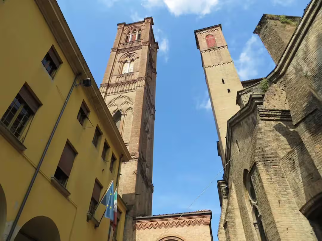 Medieval towers and historic university buildings rising above Bologna’s old town, explored on a 2.5-hour walking tour