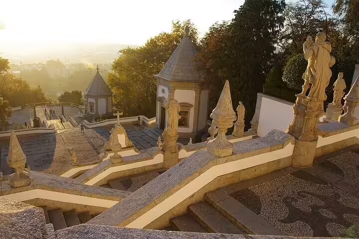 Bom Jesus do Monte baroque stairway and statues at sunset, Braga stop on Porto to Braga and Guimarães tour