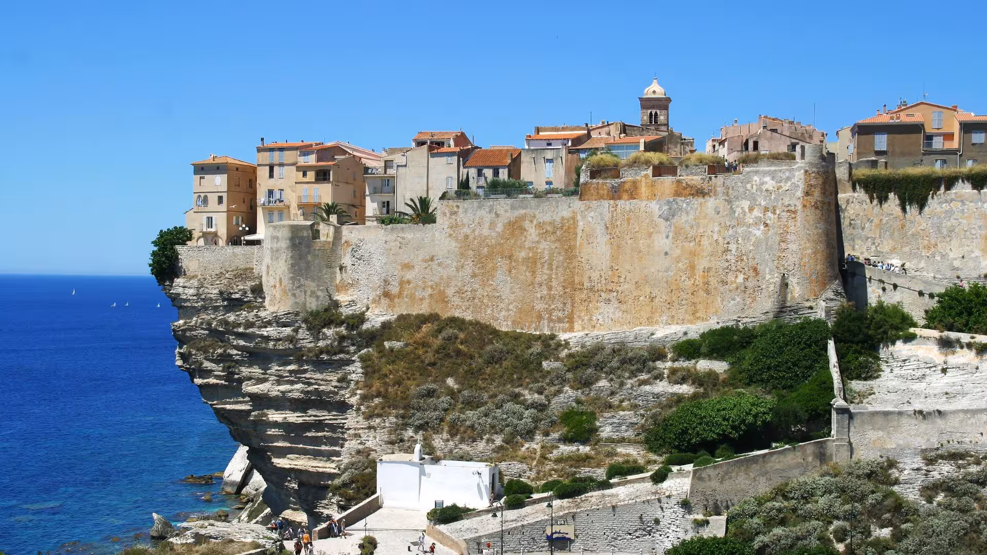Explore Bonifacio's stunning cliffside architecture on a private RIB tour from Santa Teresa di Gallura.