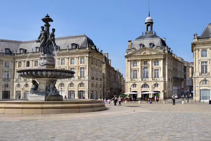 Fontaine des Trois Grâces at Place de la Bourse in Bordeaux Old Town with classic French architecture