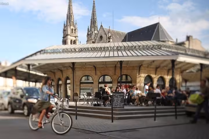 Discover charming Bordeaux streets and historic architecture on a private walking tour with wine and food tastings.