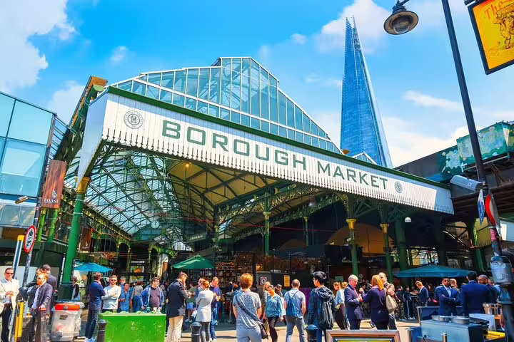 Borough Market entrance with The Shard behind on a half-day London sightseeing tour with a local guide