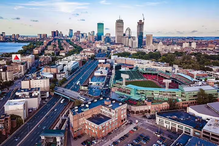 Aerial view of Boston skyline with Fenway Park and the iconic CITGO sign visible in the foreground