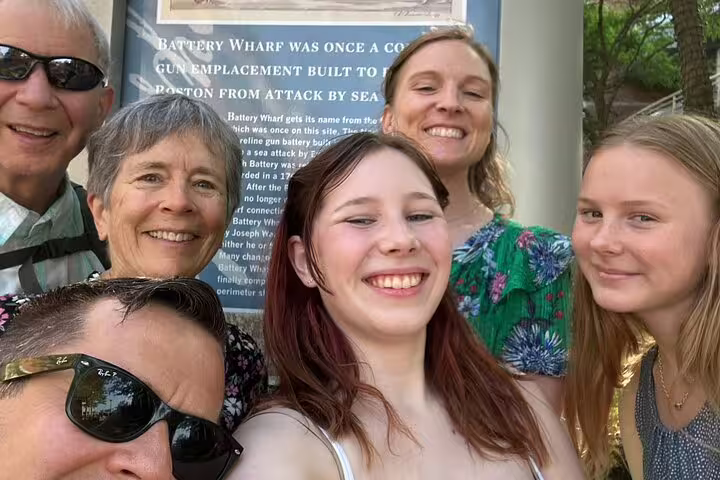 Family group selfie at Battery Wharf historical marker sign in Boston North End