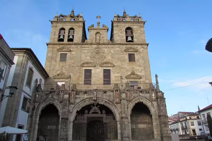 Majestic façade of Braga Cathedral, a highlight of the Braga and Guimarães tour from Porto.