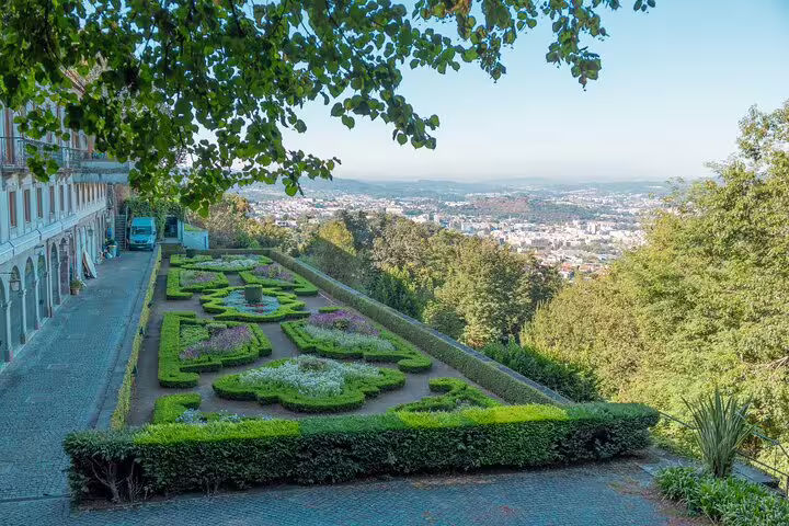 Scenic view of Braga's lush gardens and cityscape on a small group tour from a historic vantage point.