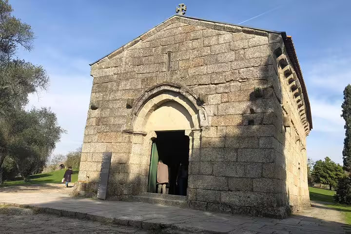 Discover the ancient stone architecture of a historic chapel in Braga on a full-day small group tour with lunch.