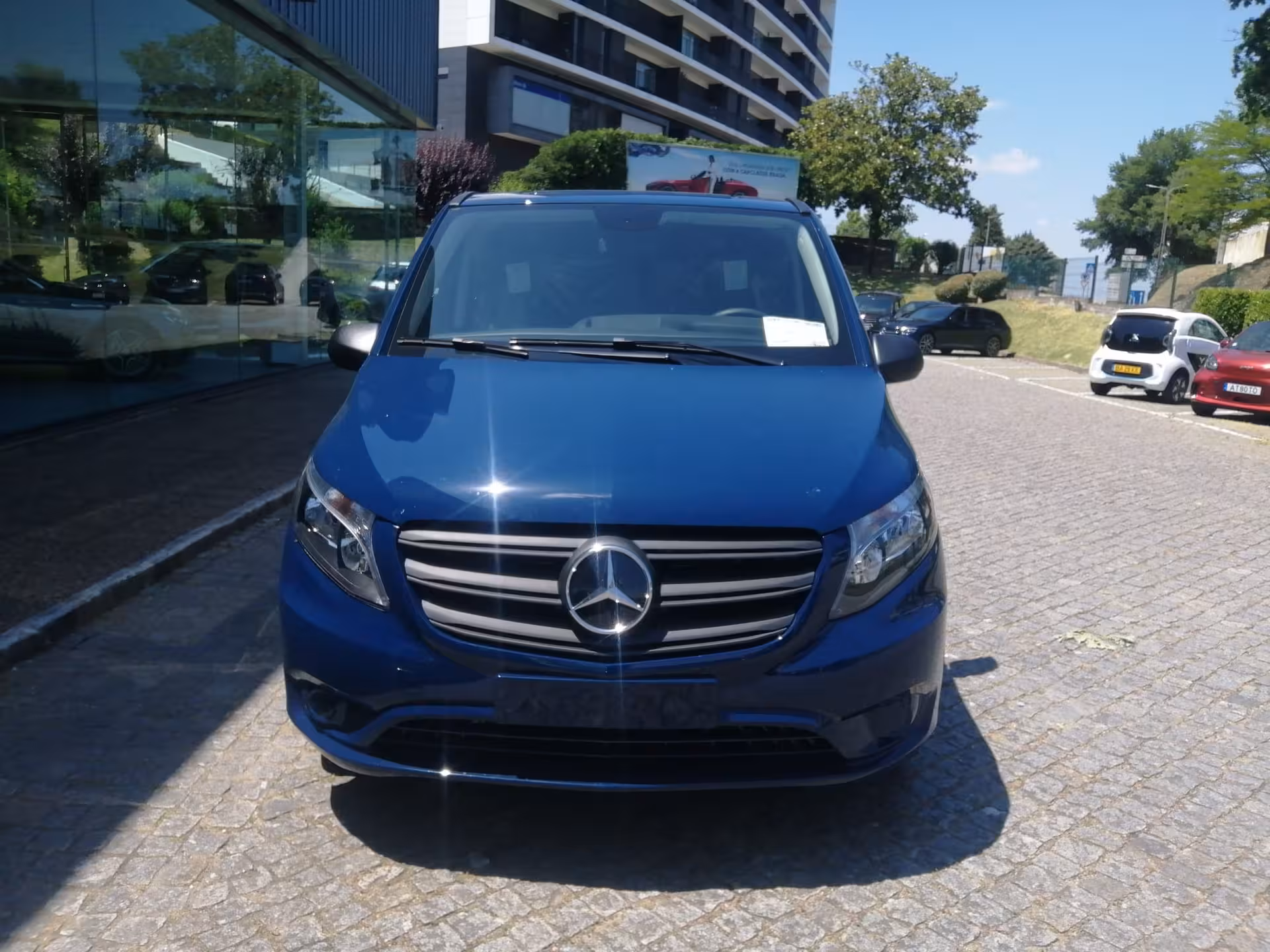 Blue Mercedes minivan for Braga to Porto Airport private transfer, reliable door-to-door chauffeur service