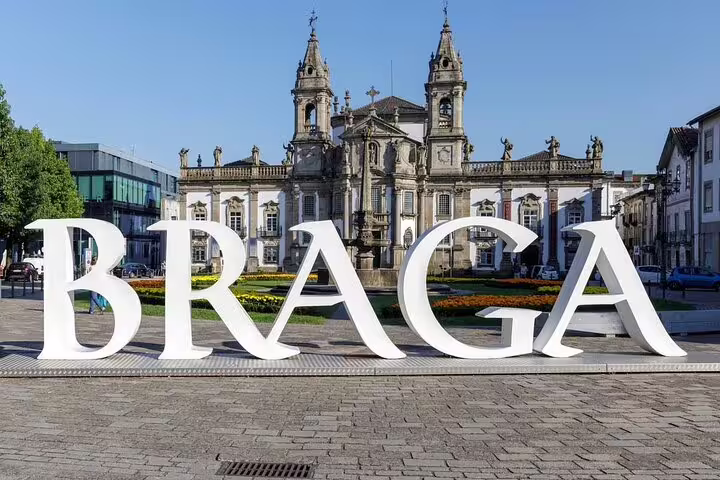 Historic Braga city center with iconic 'BRAGA' sign, a must-see on the Porto to Santiago Compostela route.