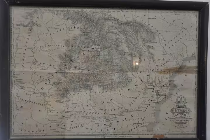 Antique map of Dacia region displayed in black frame, historical cartography from 1865