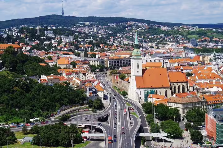 Scenic view of Bratislava's historic cityscape with St. Martin's Cathedral, ideal for a private day trip from Vienna.
