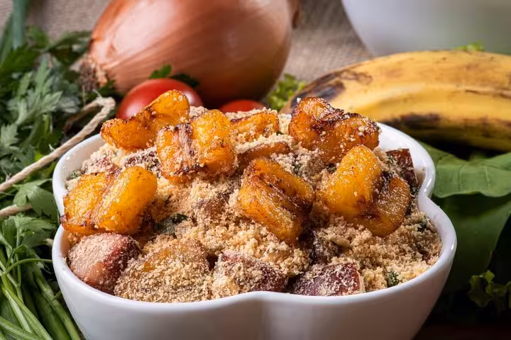 Delicious Brazilian farofa with crispy plantains and fresh ingredients at Rio's Cookin' Good food tour.