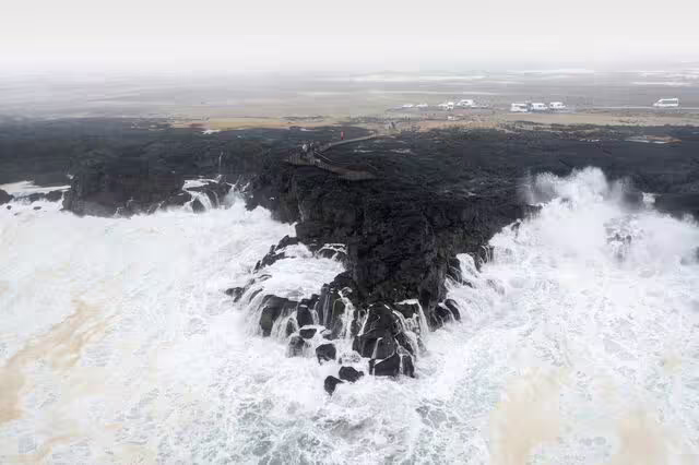 Ocean waves crashing into the Brimketill area in Reykjanes.