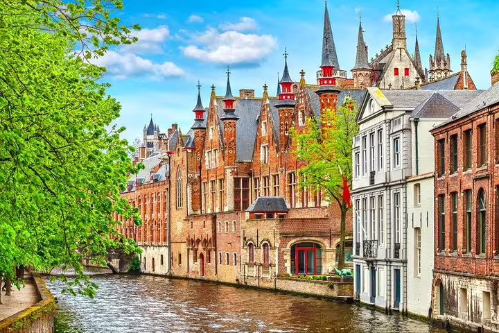 Scenic Bruges canal and medieval buildings, perfect backdrop for a self-guided e-scavenger hunt city tour