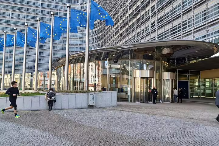 EU flags outside Berlaymont building in Brussels European Quarter, highlight of a private walking tour