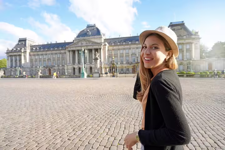 Person exploring the Royal Palace of Brussels on a private tour with a beer stop, showcasing Belgian culture and architecture.
