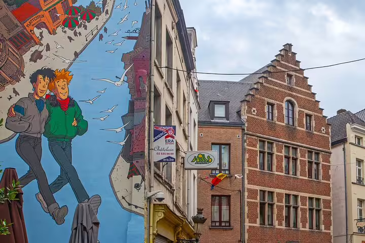 Colorful street art mural and historic architecture in Brussels, perfect for a private local walking tour exploring hidden gems.