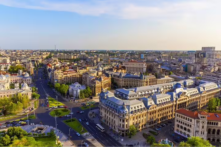 Aerial view of Bucharest Old Town with historic buildings, grand boulevards, and city skyline