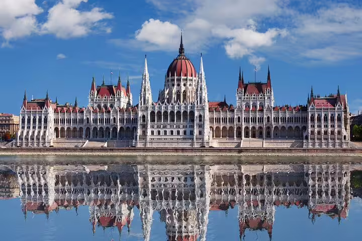 Hungarian Parliament Building reflected in the Danube River, Budapest, Gothic Revival architecture
