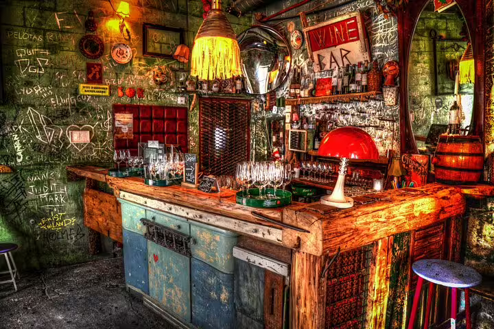 Colorful graffiti-covered bar interior in a Budapest ruin pub, featured on Your Own Budapest Ruin Bars Walking Tour