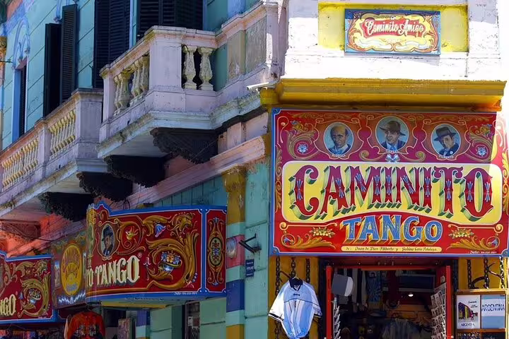 Caminito Tango sign and colorful La Boca street façades on a Buenos Aires full day sightseeing tour
